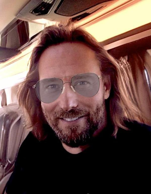 L. VanDyke hitches a ride in a private bus.