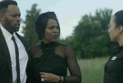 Married couple talk with another woman