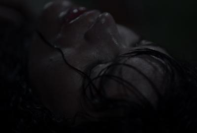 Close up of woman's face lying down