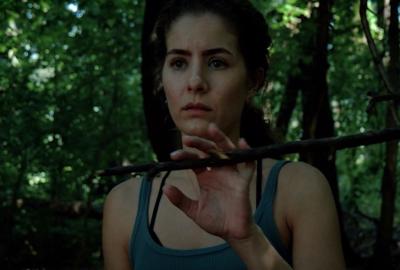 A woman jogs along the path