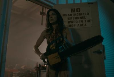 The Naked Zombie girl with her chainsaw