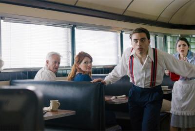 People looking startled in a diner