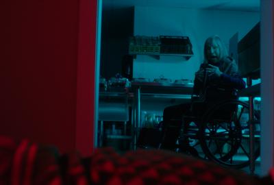 Woman in a wheelchair screams