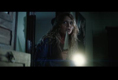 Woman with a flashlight