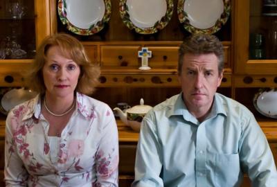 Hazel A couple sit at the table