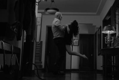 Chad angrily picks up and chokes Val