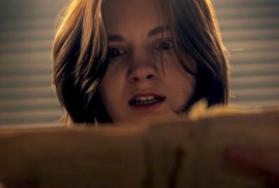 Camila reads the play