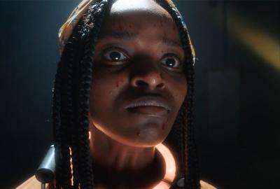 Film still of scared woman from Rhyme or Die