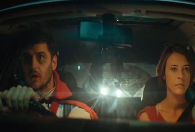 The Prey couple drives in a car