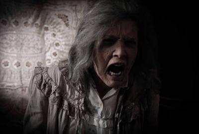 The House at the End of Time film still older woman screaming