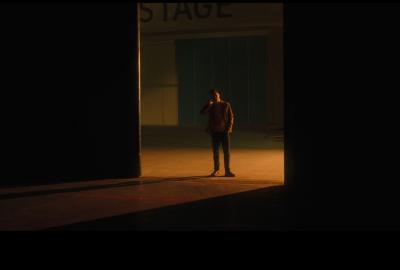 Roman talks on his cell phone 